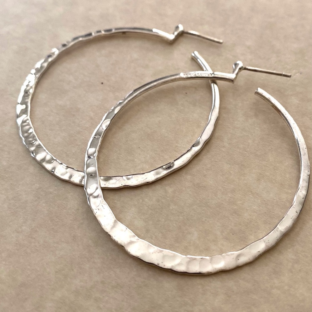 Large Sterling Silver hammered hoop earrrings.